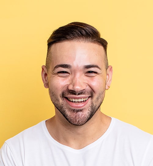 Smiling man with short brown hair.